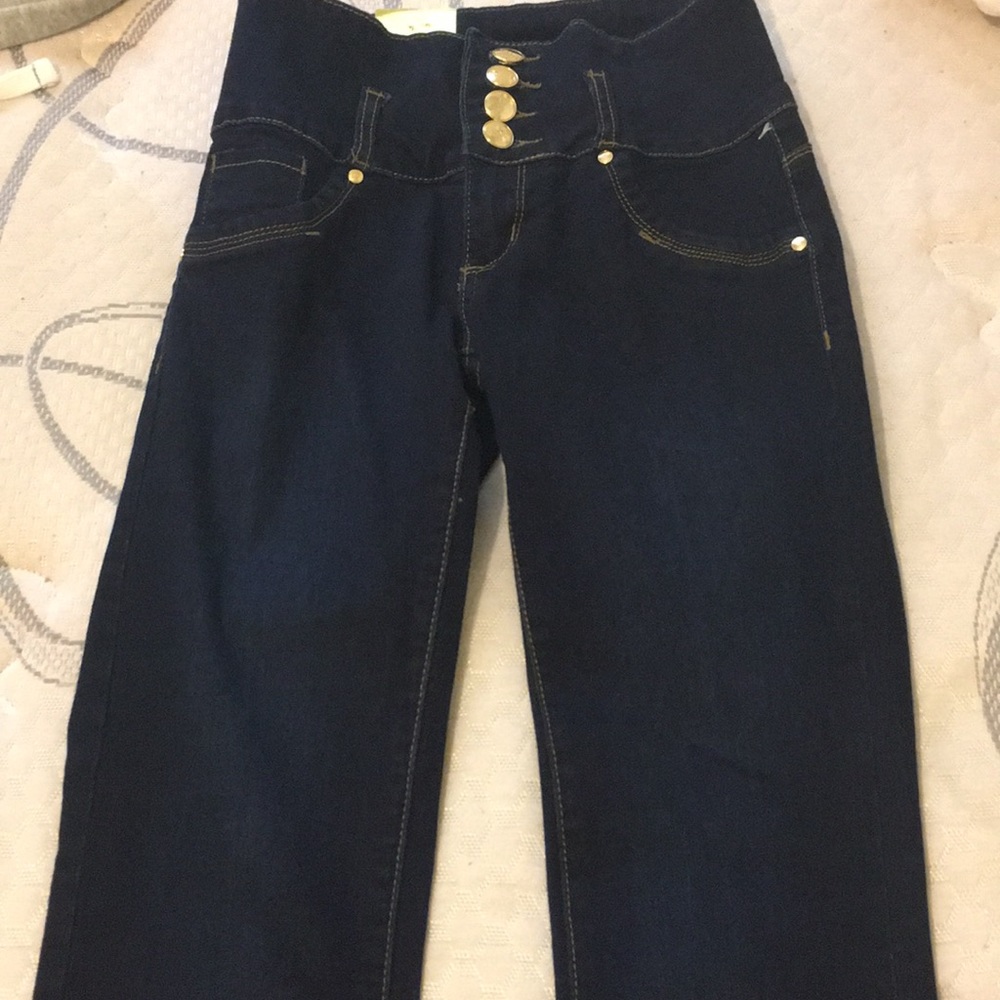 High waisted dark blue jeans